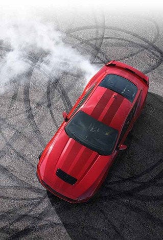 Overhead view of a 2024 Ford Mustang® model with tire tracks on pavement | Capitol Ford Santa Fe in Santa Fe NM