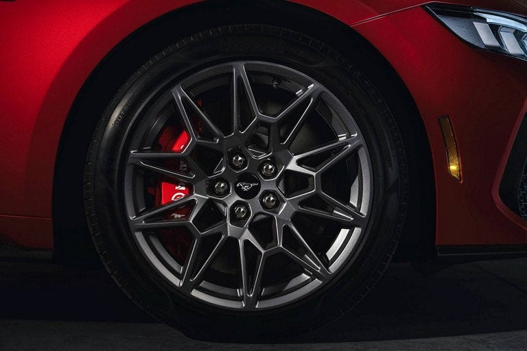 2024 Ford Mustang® model with a close-up of a wheel and brake caliper | Capitol Ford Santa Fe in Santa Fe NM