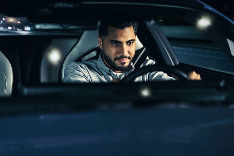 Person sitting in the driver’s seat of a parked 2024 Ford Mustang® coupe | Capitol Ford Santa Fe in Santa Fe NM