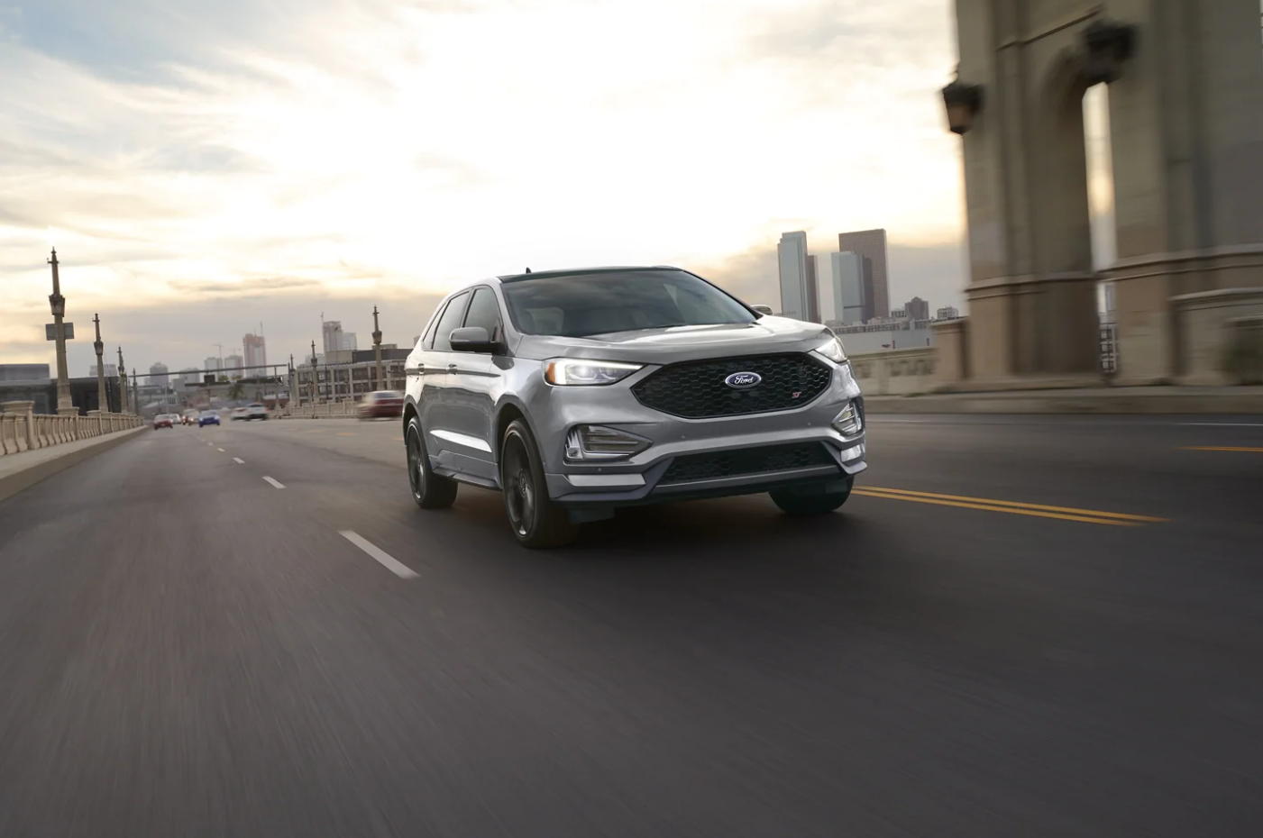 A view of the front of a silver 2023 Ford Edge