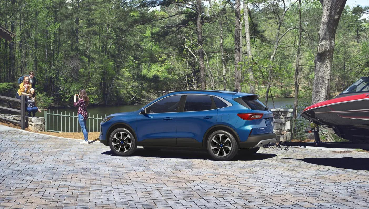 A profile view of a blue 2023 Ford Escape